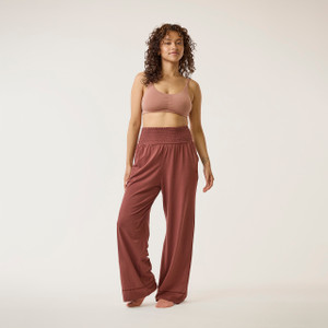 Full body front view of model wearing lounge pant in masala.