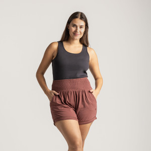 Full body front view of model wearing lounge short in masala.
