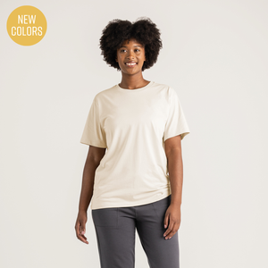 Front view of model wearing 100% Regenerative Organic Certified® Cotton - Classic Crew Neck Tee in natural.