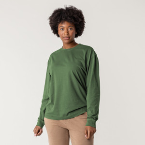 Front view of model wearing 100% Regenerative Organic Certified® Cotton - Classic Long Sleeve Tee in pine.