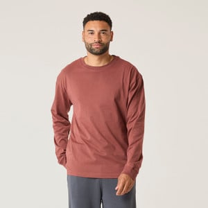 Front view of model wearing 100% Regenerative Organic Certified® Cotton - Classic Long Sleeve Tee in masala.