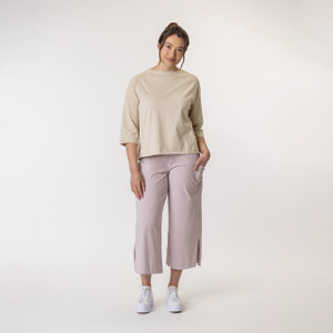Full body front view of model wearing organic cotton 3/4 sleeve tee in color pearl.