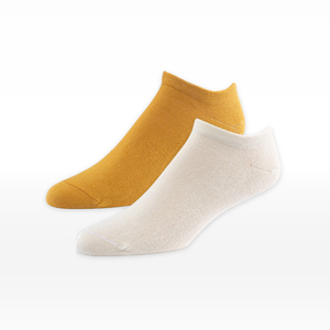 Foot form photo of organic cotton footie socks 2 pack in color gold and natural.