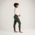 Full body side view of model wearing solid color pine organic cotton fleece leggings.