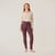 Full body front view of model wearing plum color organic cotton fleece leggings.