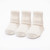 Natural white solid color organic cotton baby anklet socks. Pack of three.