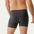 Close up back view of model wearing organic cotton essentials men's boxer briefs 2 pak in color heather grey.