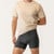 Close up front view of model wearing organic cotton essentials men's boxer brief 2 pak in color heather grey.