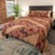 Mountain mist block print cotton duvet and sham set shown on a bed.