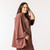 Side view of model wearing organic cotton in masala.