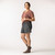 Full body side view of model wearing lounge short in pepper.