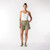 Full body front view of model wearing lounge short in bay.