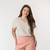 Front view of model wearing organic cotton slouch tee in pearl.