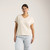 Front view of model wearing organic cotton slouch tee in natural.