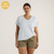 Front view of model wearing organic cotton slouch tee in light blue.