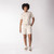 Full body view of model wearing sweat short in pearl.