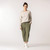 Full body view of model wearing cropped sweatpant in bay.