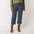 Front view of model wearing cropped sweatpant in infinity blue.