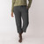 Front view of model wearing cropped sweatpant in pepper.