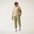 Full body view of model wearing cropped sweatpant in bay.