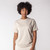 Front view of model wearing 100% Regenerative Organic Certified® Cotton - Classic Crew Neck Tee in pearl.