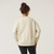 Back view of model wearing reversible fleece crew in pearl.