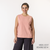 Front view of model wearing organic cotton sleeveless tee in blush.