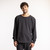 Front view of model wearing organic cotton classic crew sweatshirt in pepper.