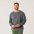Front view of model wearing organic cotton classic crew sweatshirt in infinity blue.