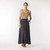 Full body front view of model wearing organic cotton maxi skirt in pepper.