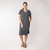 Front full body view of model wearing organic cotton kaftan dress in infinity blue.