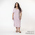 Front full body view of model wearing organic cotton kaftan dress in lavender.