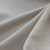 Close up photo of organic cotton kaftan dress fabric.