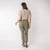 Back full body view of model wearing organic cotton cropped flare pant in bay.