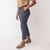 Side view of model wearing organic cotton cropped flare pant in infinity blue.