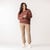 Front full body view of model wearing organic cotton cropped flare pant in turmeric.