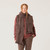Close up front view of model wearing organic cotton oversized pocket scarf in color chocolate.