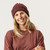 Close up of model wearing organic cotton chunky beanie in color masala stripe
