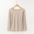 Flat lay of organic cotton layering tee in color pearl
