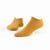 Organic cotton lightweight footie socks in color gold.