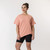Full body front view of model wearing organic cotton French tuck tee in color blush.