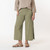 Close up view of model wearing organic cotton gaucho pant in color bay.