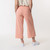 Back view of model wearing organic cotton gaucho pant in color blush.