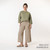 Full body view of model wearing organic cotton gaucho pant in color putty.