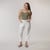 Full body front view of model wearing organic cotton harem pant in color salt.