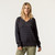 Front view of model wearing 100% Regenerative Organic Certified® Cotton  V-Neck Sweater in color pepper.