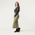 Side view of model wearing 100% organic cotton surplus skirt in color bay.
