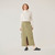 Front view of model wearing 100% organic cotton surplus skirt in color bay.