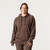Front view of model wearing 100% Regenerative Organic Certified® Cotton Classic Hoodie in color chocolate.