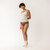 Full body front view of model wearing organic Cotton Women's Low-Rise Bikini in color sable.